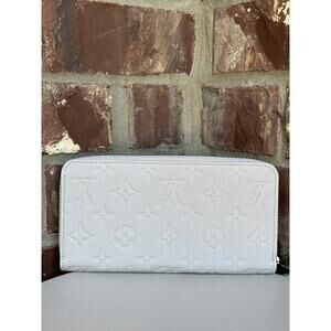 Louis VuittonZippy Wallet Monogram Empreinte Leather 51194